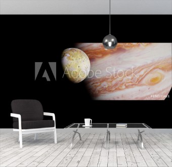 Picture of Jupiters moon Io in front of the planet Jupiter